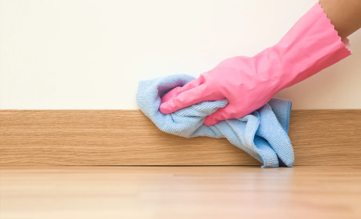 Cleaning with bleach to prevent mold from returning.
